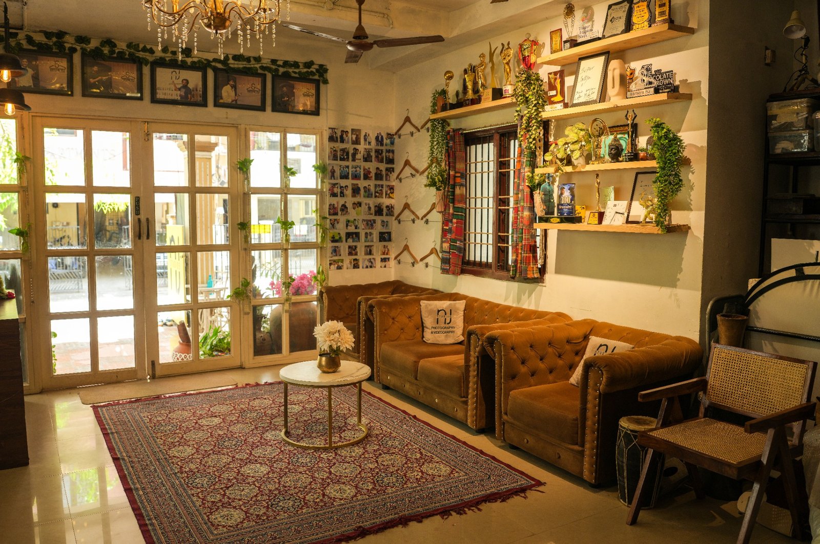 Studio lounge with sofa, decor, trophies and creative interiors